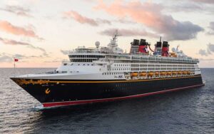 cruise ship at sea with sunset sky disney cruise line port canaveral space coast