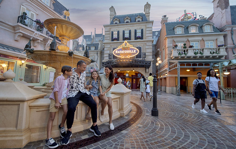 family in france pavilion with remy attraction epcot at disney world
