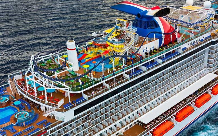 upper deck ship with coaster and water slides at carnival cruise line port canaveral space coast