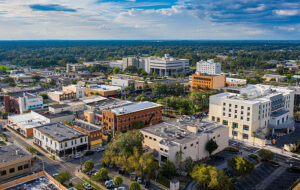 aerial view of downtown ocala with historic buildings streets and cloudy sky