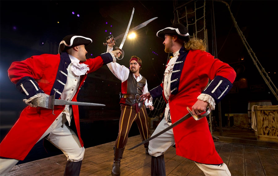pirates fighting with swords on deck pirates voyage dinner show panama city beach
