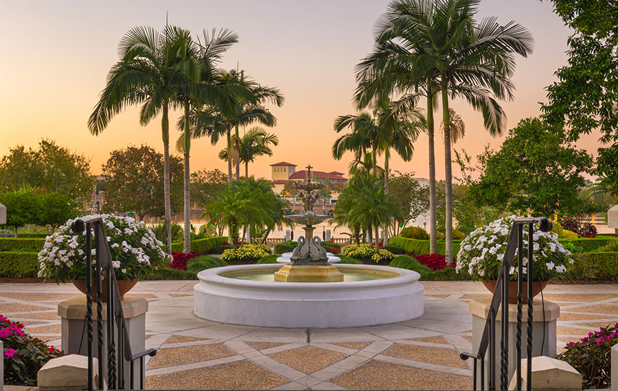 twilight view of fountain and lake at hollis garden lakeland