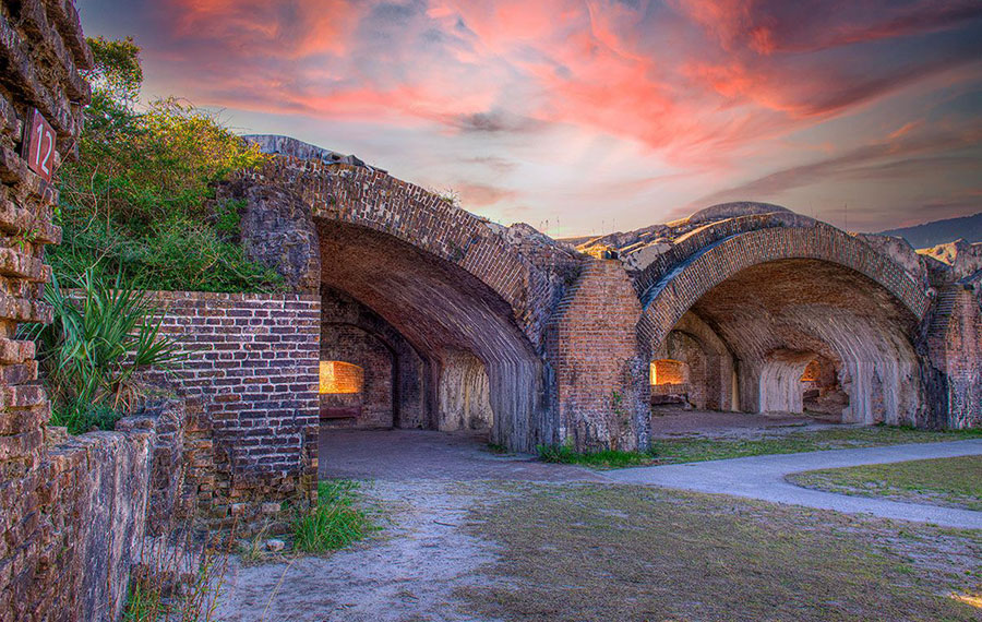 sunset sky view of brick arches at fort pickens pensacola