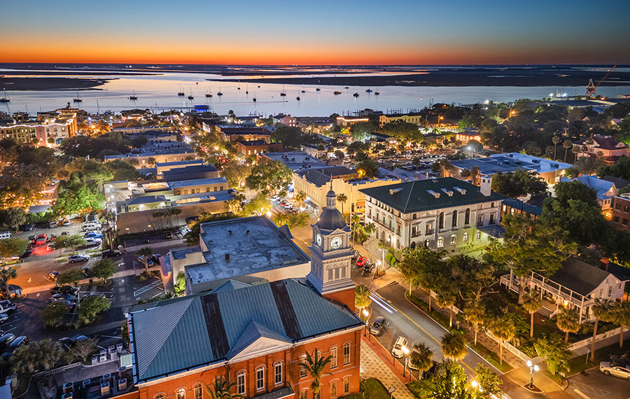aerial view sunset with lighted downtown and river fernandina beach amelia island