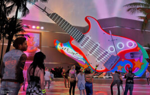 artists rendering of night exterior guitar with new sign at rock n rollercoaster with muppets disneys hollywood studios