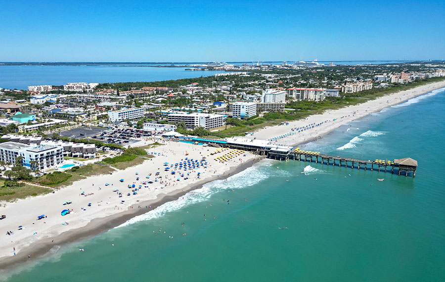 aerial view over daytime cocoa beach with westgate pier