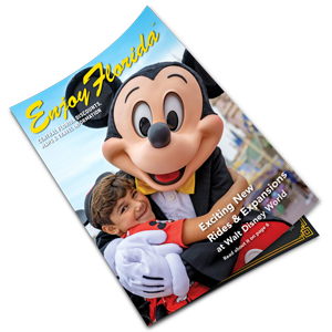 enjoy florida magazine with fanning page featuring costumed mickey mouse hugging boy