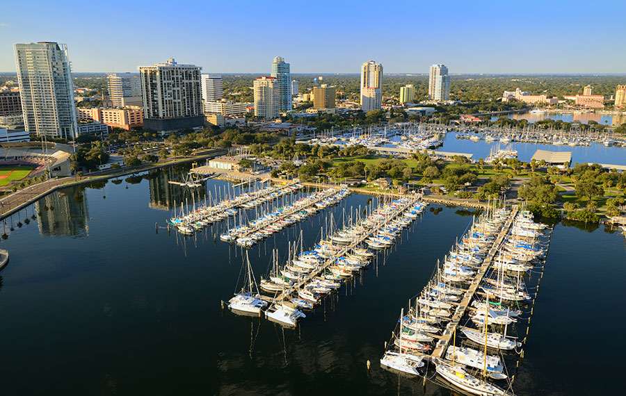 aerial view of downtown st petersburg with marinas full of sailboats