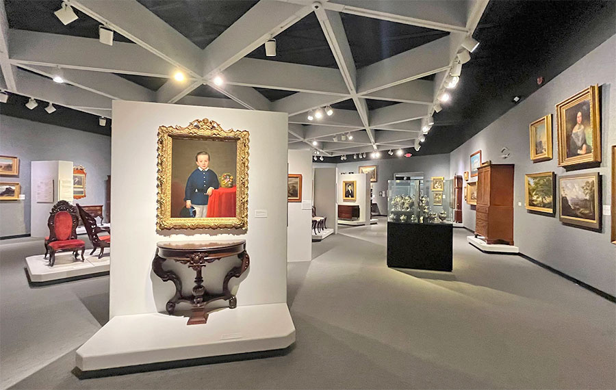 exhibit room with framed oil paintings at museum of arts sciences daytona beach