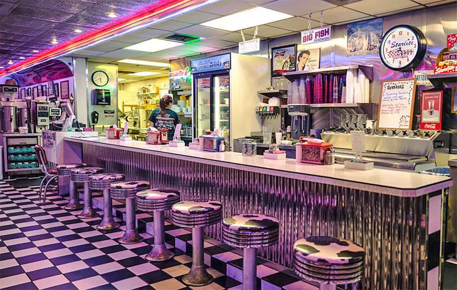 retro diner interior with chrome and counter at starlite diner daytona beach