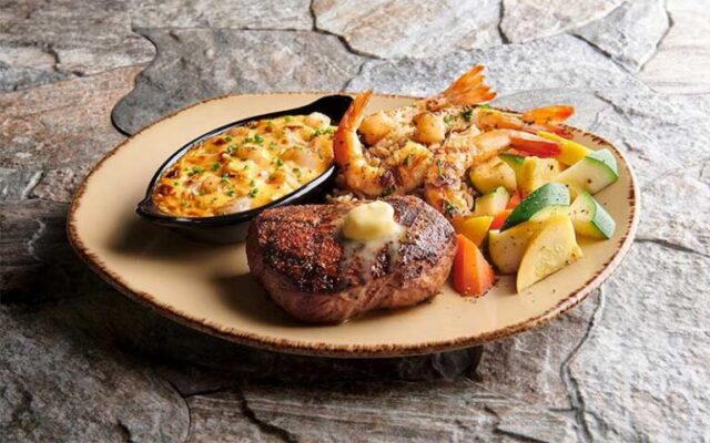 Located at Disney Springs in Orlando, the T-Rex Cafe offers an exhilarating prehistoric dining experience for tourists of all ages. Step into a world where dinosaurs roam among waterfalls, geysers, and fossils, creating a captivating atmosphere that transports visitors back in time. 
@t_rexcafe